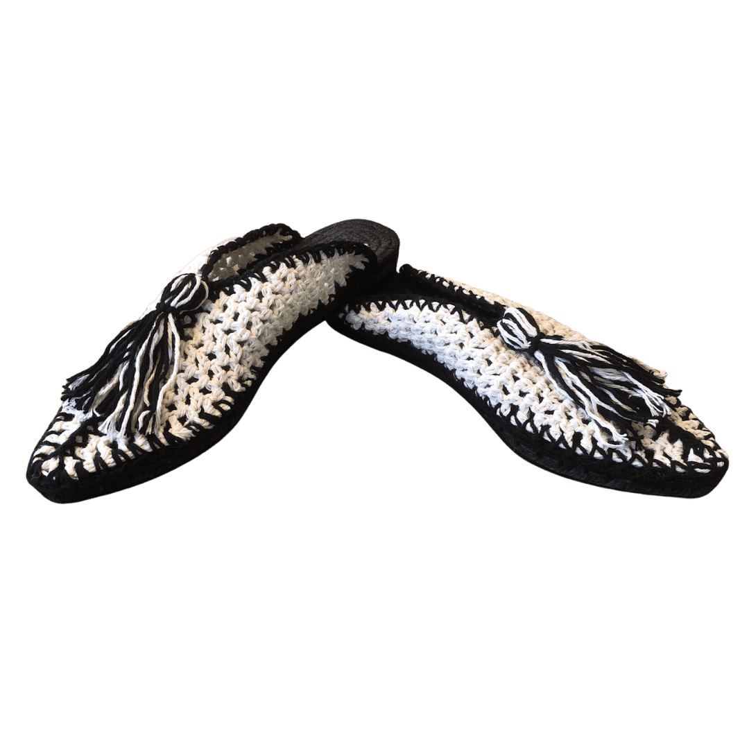 Pantufla blanco y negro